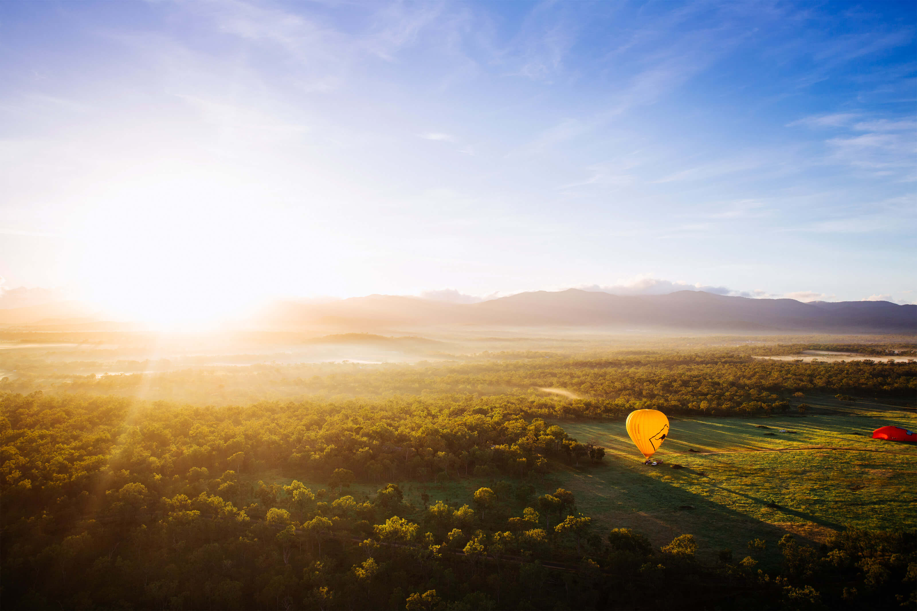 yellow hot air balloon sunrise